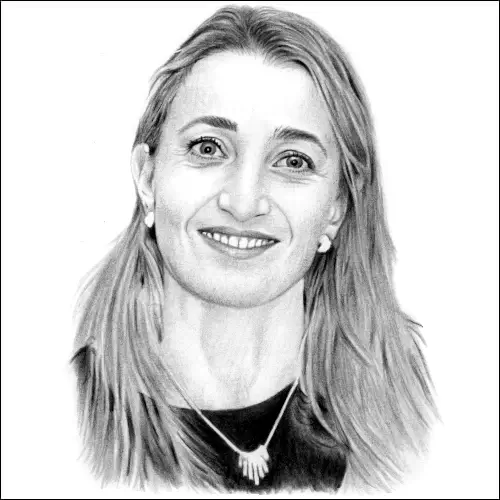 Lifelike pencil portrait of a smiling woman with long hair, pearl earrings, and pendant necklace, drawn with delicate detail.